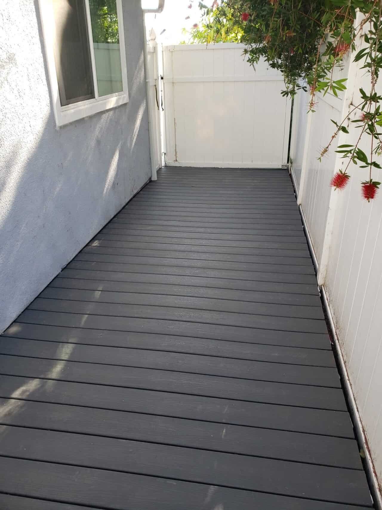 walk-way deck that leads to a gate in orange county