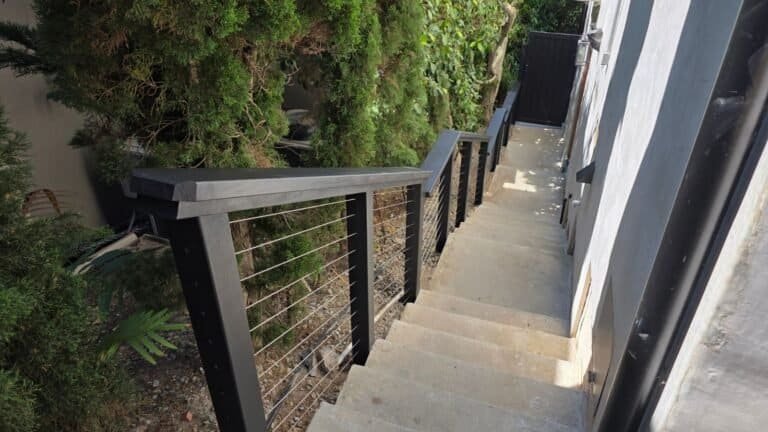 Exterior Stairs with black railings and cable wire design